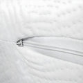 Detailed close-up of the secure zipper on the Orion 2-Stage Crib & Toddler Mattress casing.