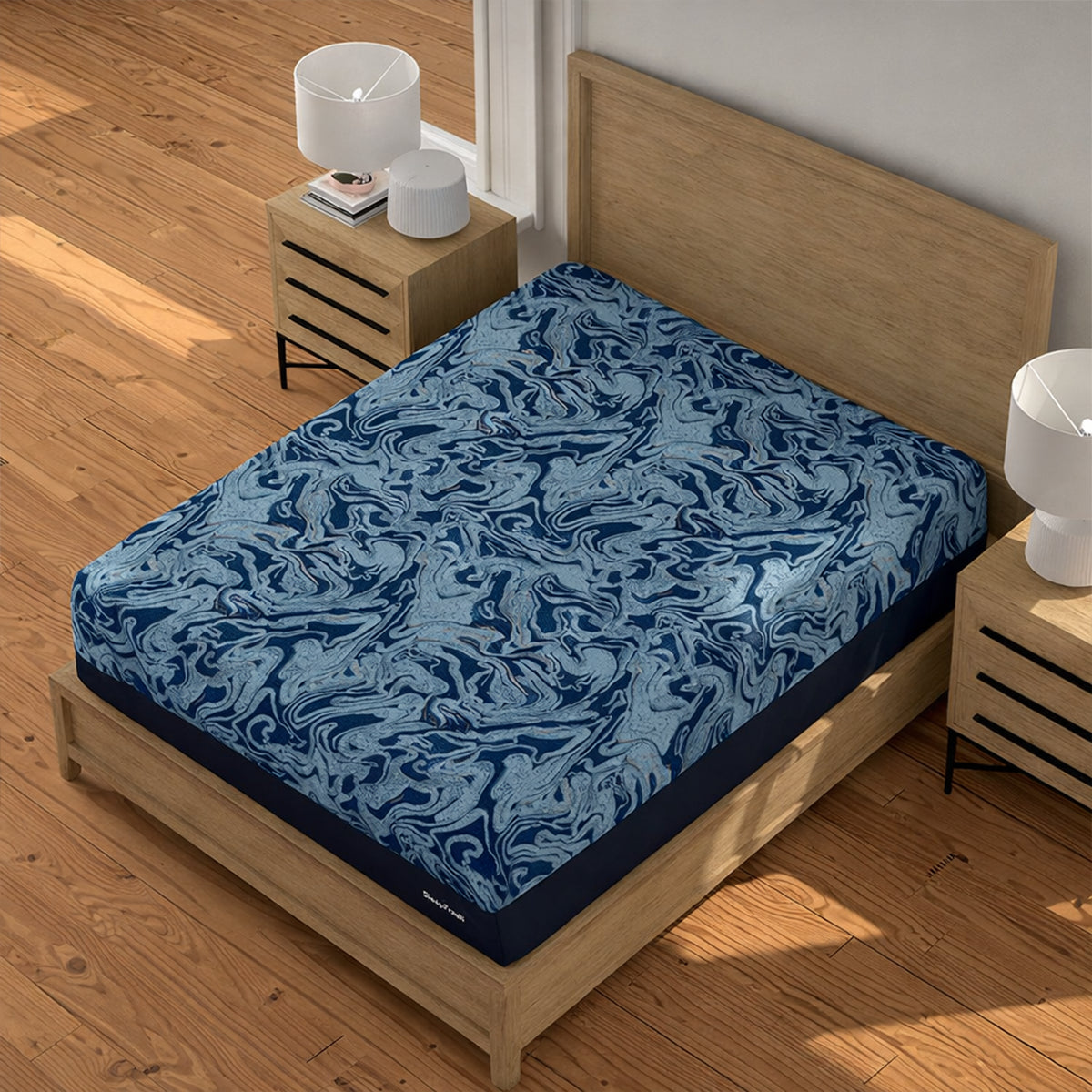 Cyprus Latex Mattress corner view showing Sleep Fresh branding and navy blue side panel fabric.