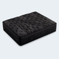 Angled top view of the Black Diamond Lux 15-inch mattress showing its unique black wave-textured quilted Euro top surface.
