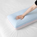 Hand testing the responsive, pressure-relieving foam of a Sleeptone Cool Control side sleeper pillow.
