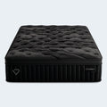Front view of the Black Diamond Lux mattress by Diamond Mattress featuring the brand logo on a high-profile 15-inch design.
