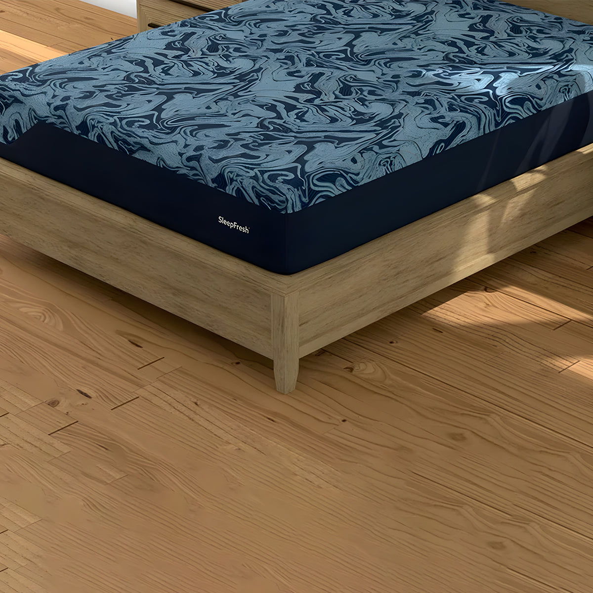 Cyprus Latex Mattress corner view showing Sleep Fresh branding and navy blue side panel fabric.