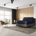 S4 Nebula Luxury Hybrid Mattress on an adjustable base with the head raised in a modern luxury bedroom setting.