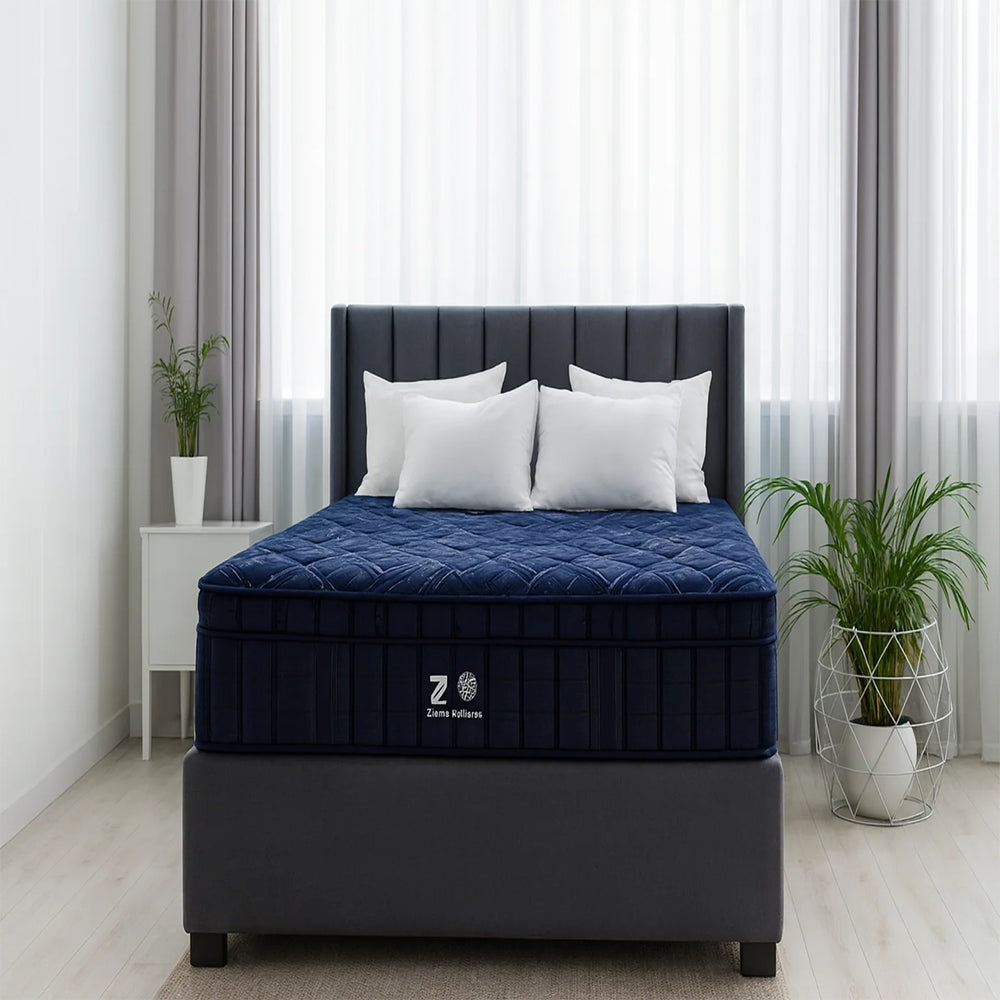 Luxury Americanstar Phantom Ultra 16-inch tight-top plush mattress on a modern grey upholstered storage bed frame in a bright master bedroom.
