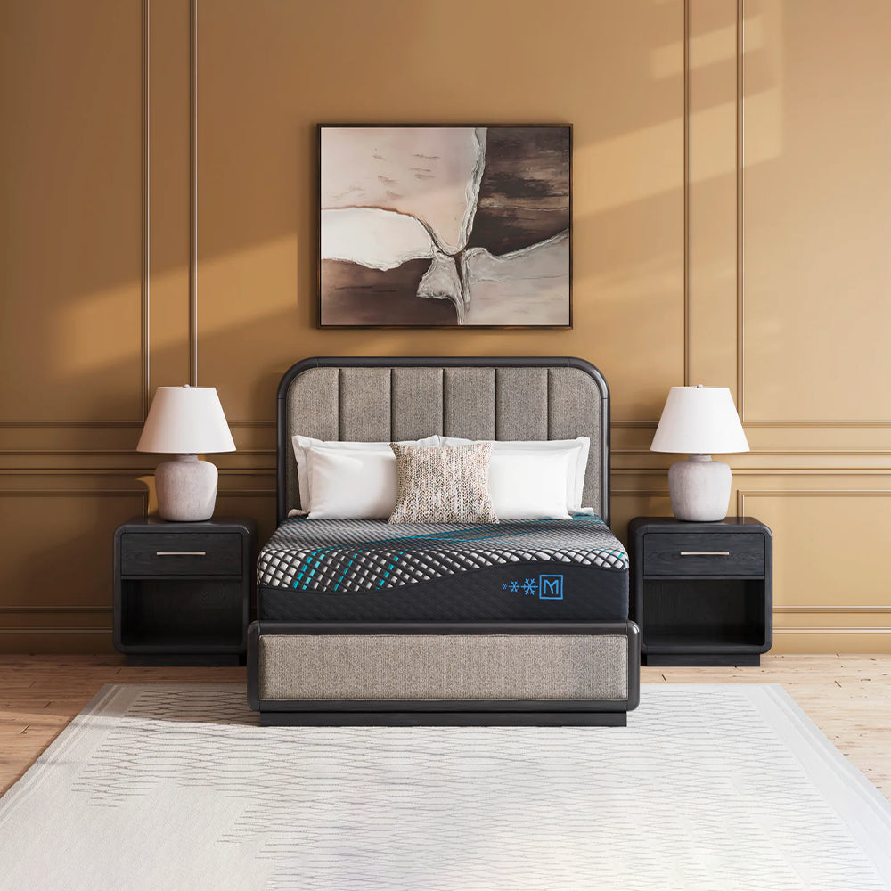 Contemporary bedroom interior featuring the Ashley Furniture Millennium 2.0 Hybrid Plush Mattress for superior motion isolation and sleep support.
