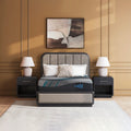 Contemporary bedroom interior featuring the Ashley Furniture Millennium 2.0 Hybrid Plush Mattress for superior motion isolation and sleep support.
