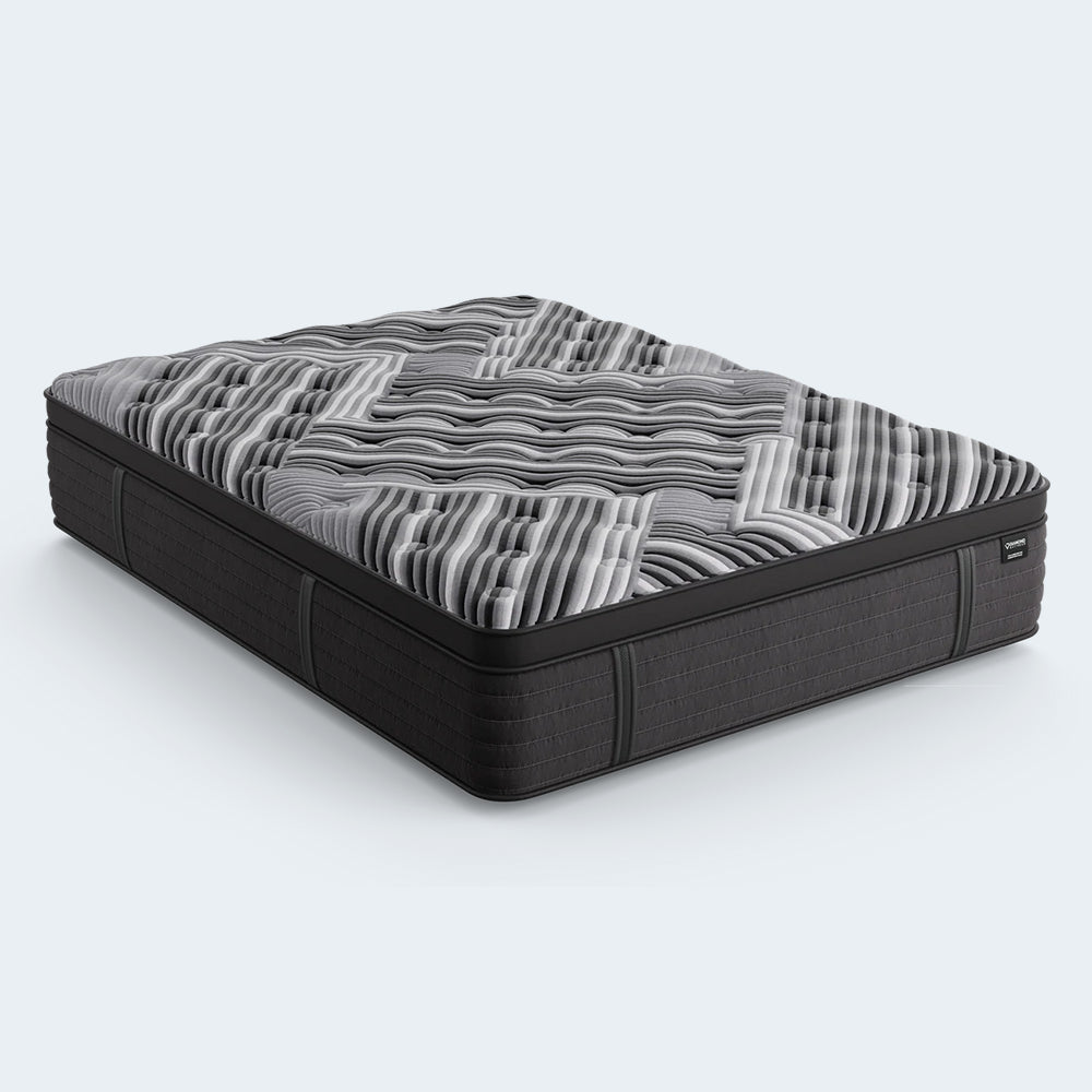 Left-side angle of the 15" Dreamstage 2.0 Calm Quilted Mattress highlighting the deep-textured quilted surface and modern black-and-grey aesthetic.
