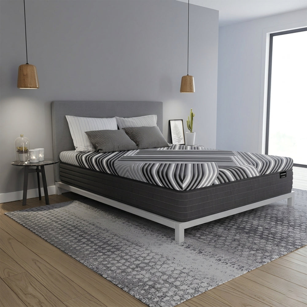 Luxury modern bedroom featuring the Dreamstage 2.0 Calm Hybrid 14" mattress for superior motion isolation and pressure-relieving comfort.
