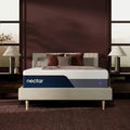 Frontal view of the Nectar Luxe 14-inch Medium Memory Foam Mattress styled in a modern master bedroom with a minimalist platform bed frame.
