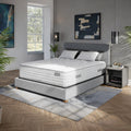 14-inch Versailles Tufted Mattress in bedroom setting on a modern grey upholstered frame with headboard.