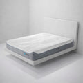 Side view of the BEDGEAR H6 Hybrid Performance Mattress on a white platform bed with a wavy textured cooling cover.