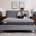 Side view of the Polaris 12" Activair Hybrid Mattress on a stylish platform bed in a modern bedroom setting.
