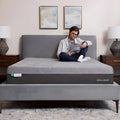 Wide angle view of the Polaris 12" Aeroflex Hybrid Mattress styled in a luxury bedroom with modern decor.