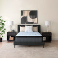 Modern master bedroom featuring the Ashley Destin Cove 15-inch Ultra Plush Euro Top mattress on a charcoal grey upholstered bed frame.
