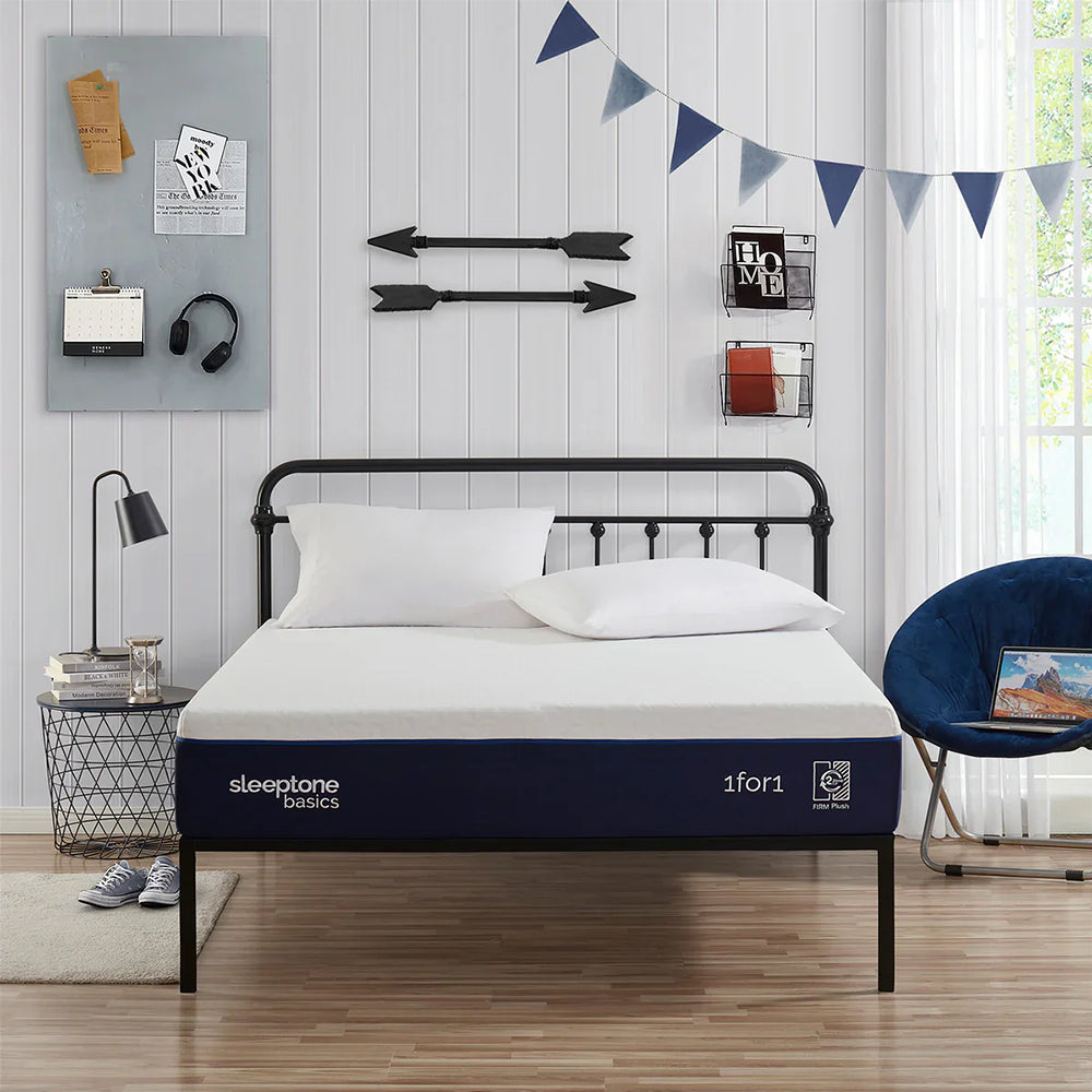 Modern bedroom featuring the Sleeptone 10-inch memory foam mattress styled with white pillows, showcasing its sleek profile and 2-in-1 adjustable firmness.
