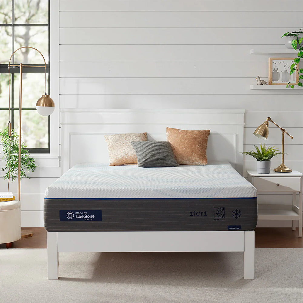 Front view of the Sleeptone 12-inch adjustable hybrid mattress on a white wooden bed frame in a bright bedroom setting.
