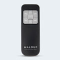 Wireless remote control for the Malouf E255 adjustable bed base featuring Zero Gravity and Anti-Snore preset buttons.
