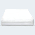 Front view of the 5 inch organic mini crib mattress designed for compact nursery furniture.