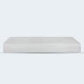  Side view of the Orion 2-Stage Crib & Toddler Mattress showing its 5-inch clean profile.