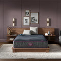 Beautyrest World Class Level Three Hybrid 13" Firm Mattress on a wooden bed in a luxury bedroom.
