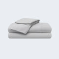Folded grey Ver-Tex cooling sheet set by BEDGEAR for moisture-wicking, breathable comfort.
