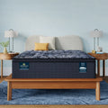 Serta Perfect Sleeper X Lexton Medium Pillow Top 14.25 Inch Hybrid Mattress on a stylish wooden platform bed.
