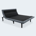 Three-quarter view of the Customatic Opus adjustable bed base with motorized head elevation and premium grey upholstery.
