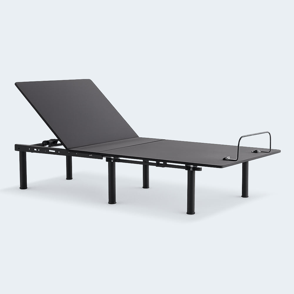 Weekender 50 Series Adjustable Bed Base by Malouf shown in a head-elevated position for reading and ergonomic comfort.
