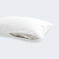 Close-up of South Bay Luxury Resort Pillow revealing adjustable kapok and 3D fiber blend fill.
