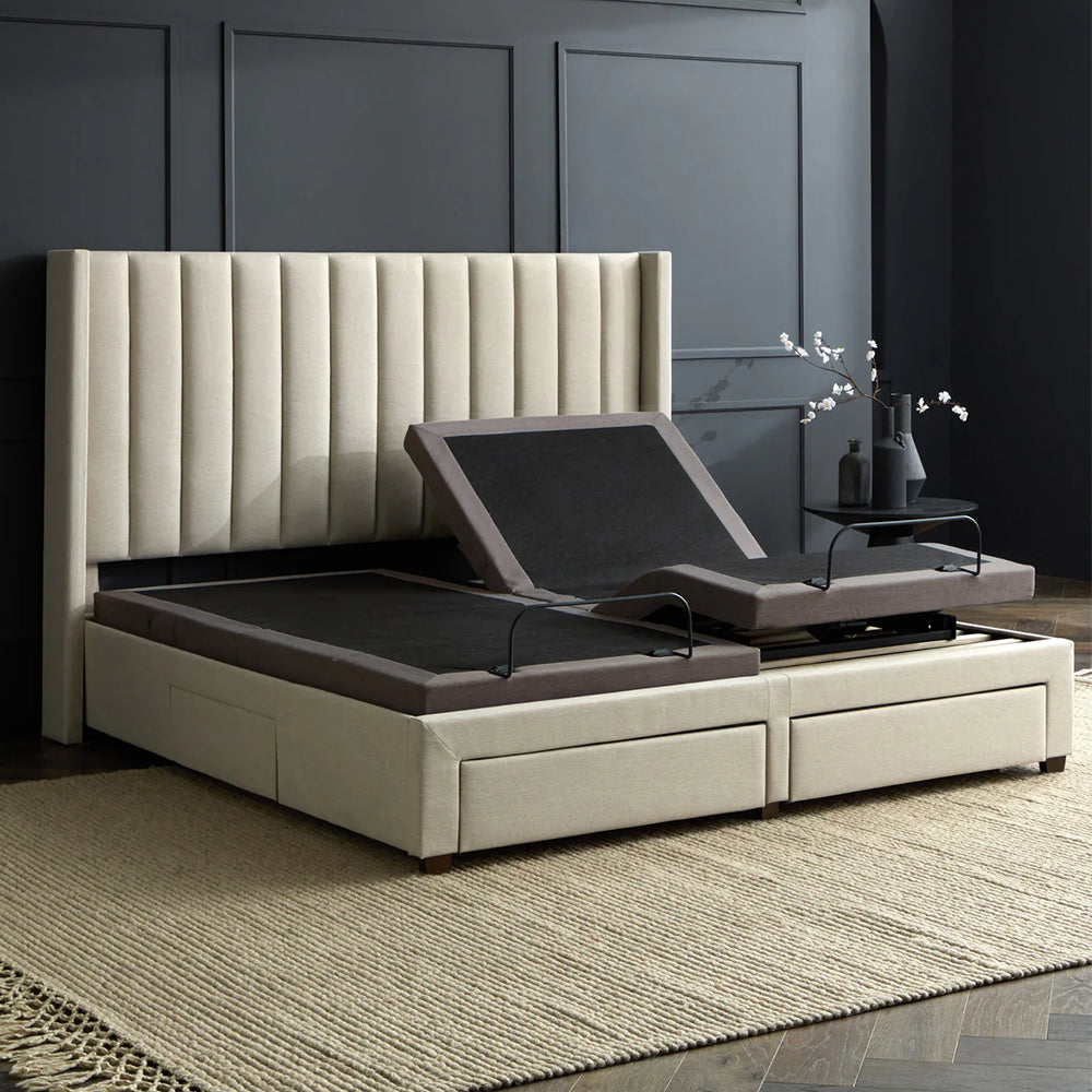 Side profile of the Malouf S655 adjustable base demonstrating simultaneous head, foot, and pillow tilt articulation within a bed frame.
