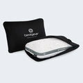BEDGEAR Storm Performance Travel Pillow partially tucked into its black protective carrying bag for easy transport.