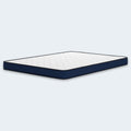 Full perspective view of the Ashley 6-inch firm mattress illustrating the slim 6-inch height and modern two-tone fabric design.