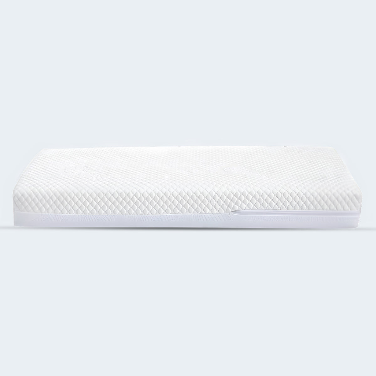 Side view of the 6-inch Celsius Organic Cotton 2-Stage Crib Mattress in a clean studio setting.