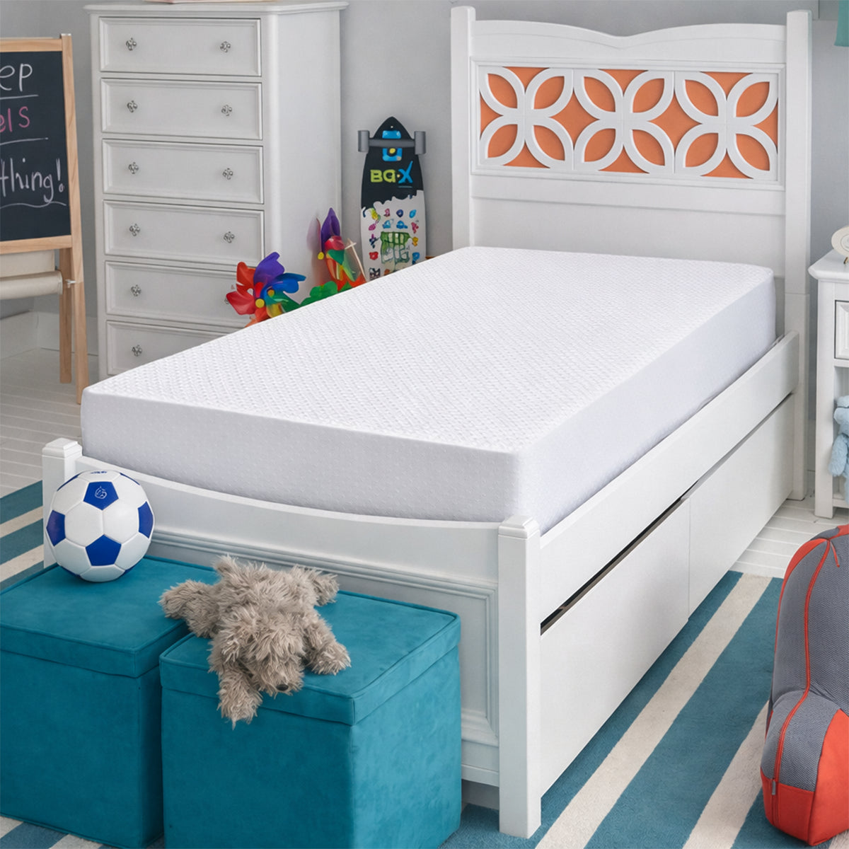 BEDGEAR Dri-Tec Kids Mattress Protector shown in a child's bedroom setting on a white twin bed frame with blue accents.