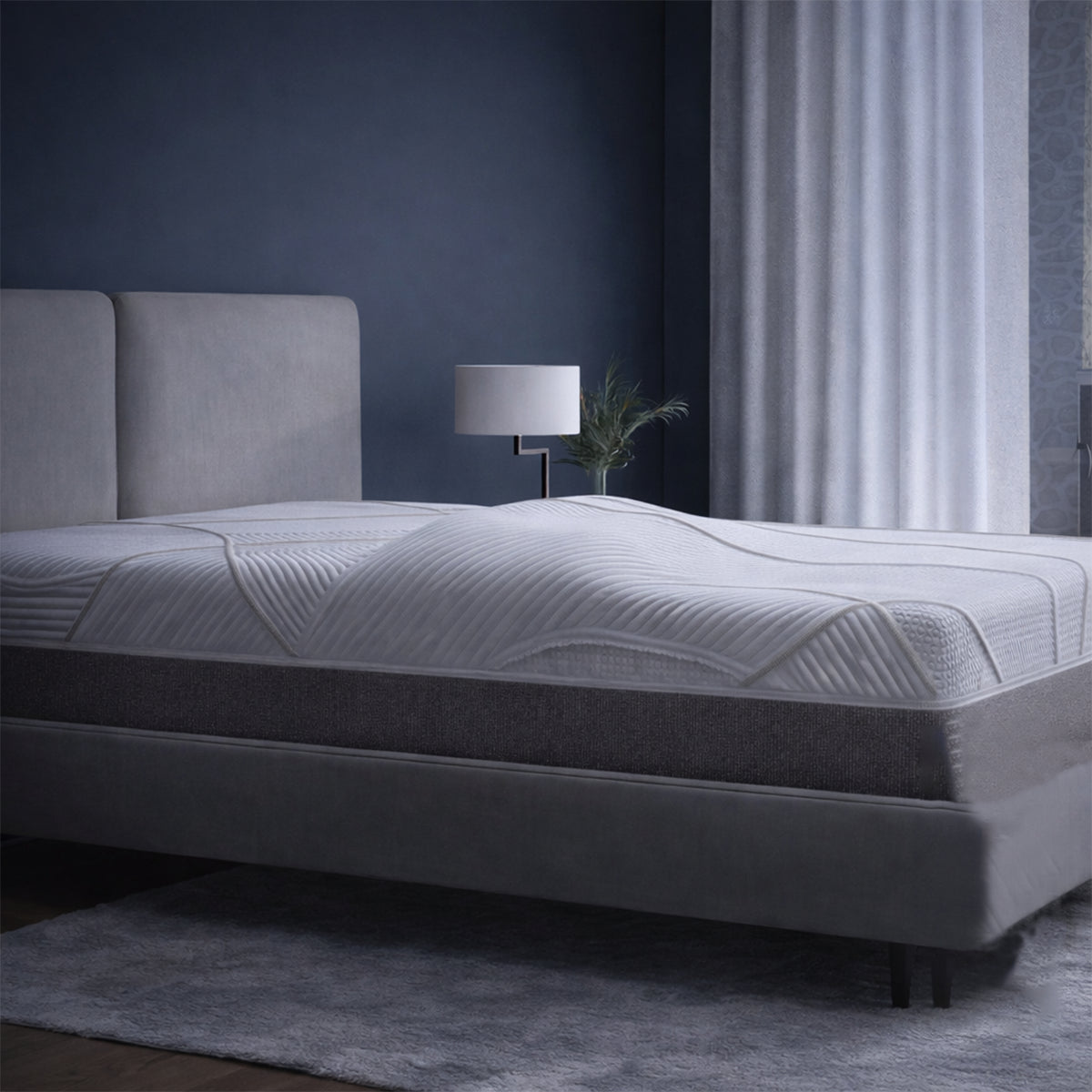 Perspective view of the 12" Medium Foam Mattress by GhostBed highlighting the unique wavy cooling cover design.