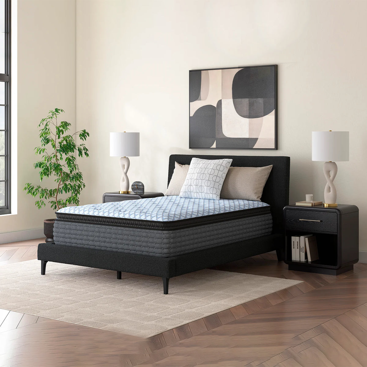 The Destin Cove 15-inch ultra plush mattress by Ashley styled in a bright bedroom, highlighting the blue geometric quilted cooling cover.

