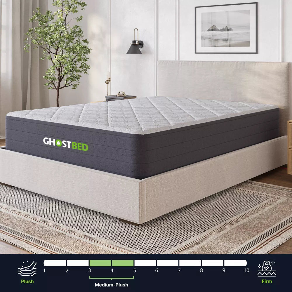 Elegant bedroom setting with the GhostBed 12-inch medium-plush mattress, offering a combination of pressure-relieving foam and pocketed coils.
