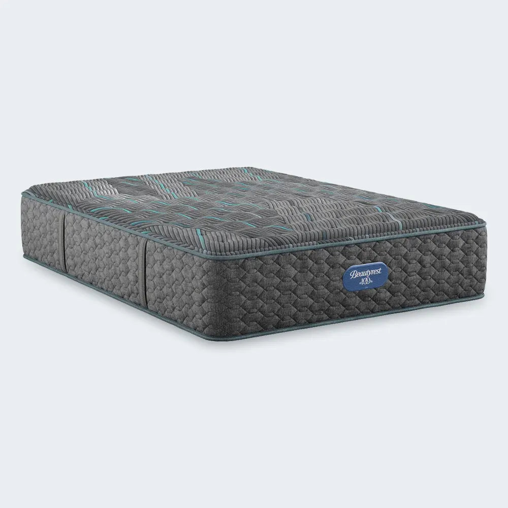 Simmons Beautyrest Level Two 14 Inch Plush Mattress with a grey and teal contouring comfort cover.
