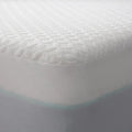 Corner view of a Malouf HyperChill mattress protector with a deep-pocket design for a secure fit.
