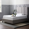 White Malouf Prime Mattress Protector on a queen bed, offering waterproof protection from spills.

