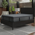 Three-quarter angle of the South Bay Allureluxe Bamboo Hybrid Elite medium mattress featuring a grey tufted cooling cover in a luxury bedroom.
