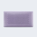 Zoned ventilation holes in a Malouf lavender memory foam pillow for enhanced airflow and neck support.