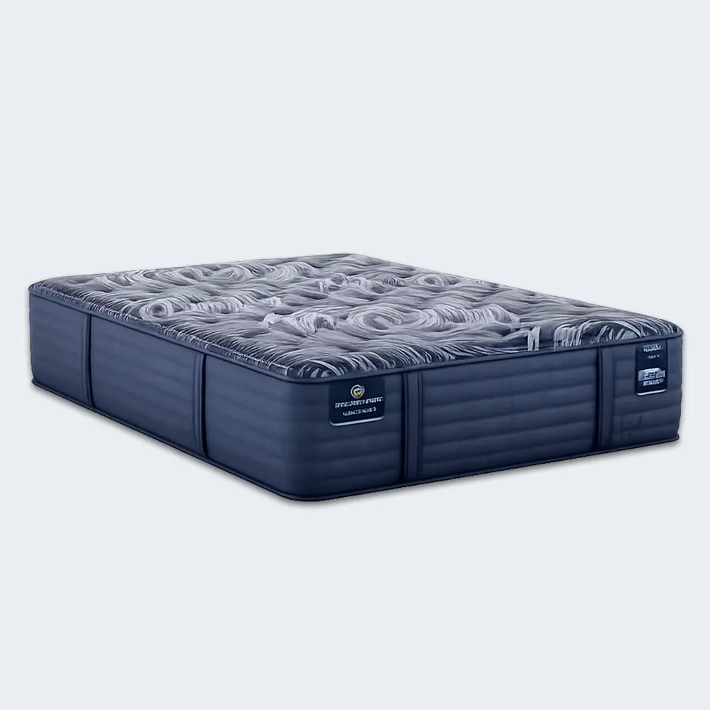 Serta Perfect Sleeper Pro Paris 15 inch latex hybrid mattress featuring a dark blue quilted design and cooling top.
