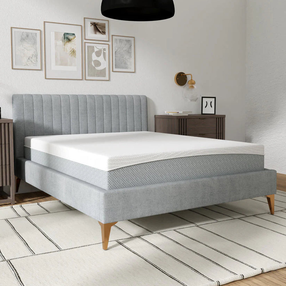  Perspective view of the South Bay EcoCore Hybrid 10-inch mattress showing the white breathable top and grey patterned side fabric.