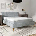  Perspective view of the South Bay EcoCore Hybrid 10-inch mattress showing the white breathable top and grey patterned side fabric.