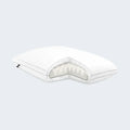 Cutaway of Malouf Gel Convolution pillow showing the convoluted foam core and plush down alternative fill.
