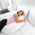 Side sleeper using the BEDGEAR Body Pillow for ergonomic neck, shoulder, and hip support in bed.
