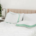 BEDGEAR Level pillows on a bed showing different loft heights and mint green Air-X breathable mesh.
