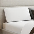 South Bay cooling gel and bamboo charcoal pillow on a bed, providing ergonomic neck support and comfort.
