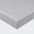 Close-up corner of a grey Hyper-Wool fitted crib sheet for a smooth, snug mattress fit.
